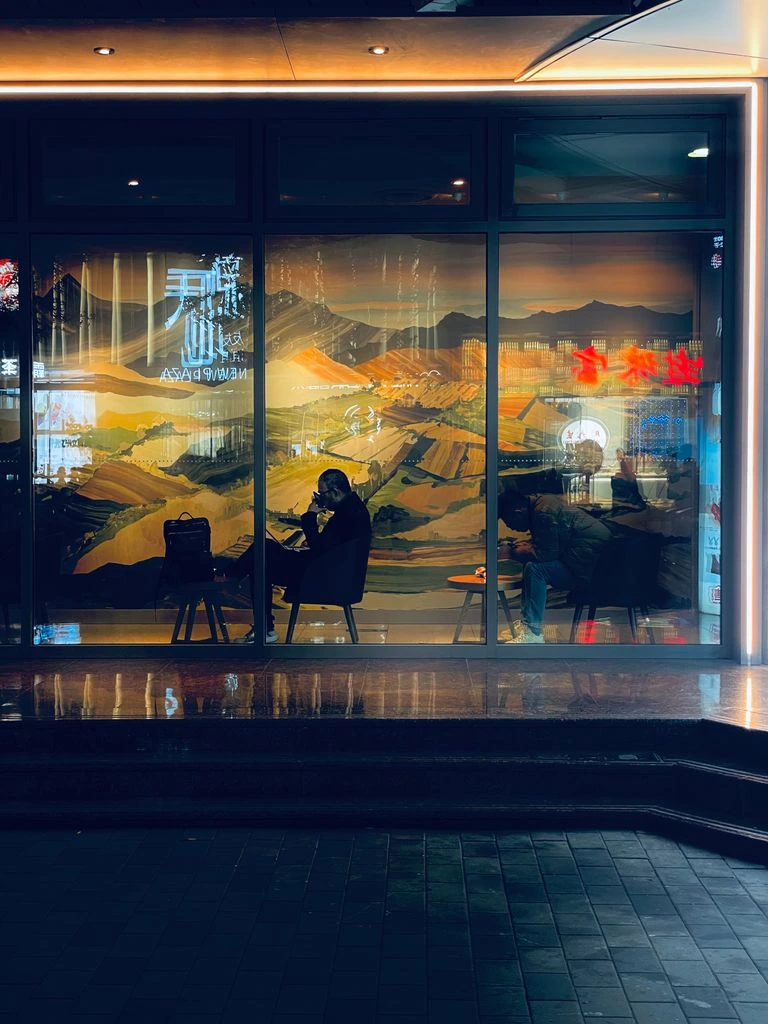 Illustration of a warm bingo lounge with three glowing room thumbnails floating like a tilted display
